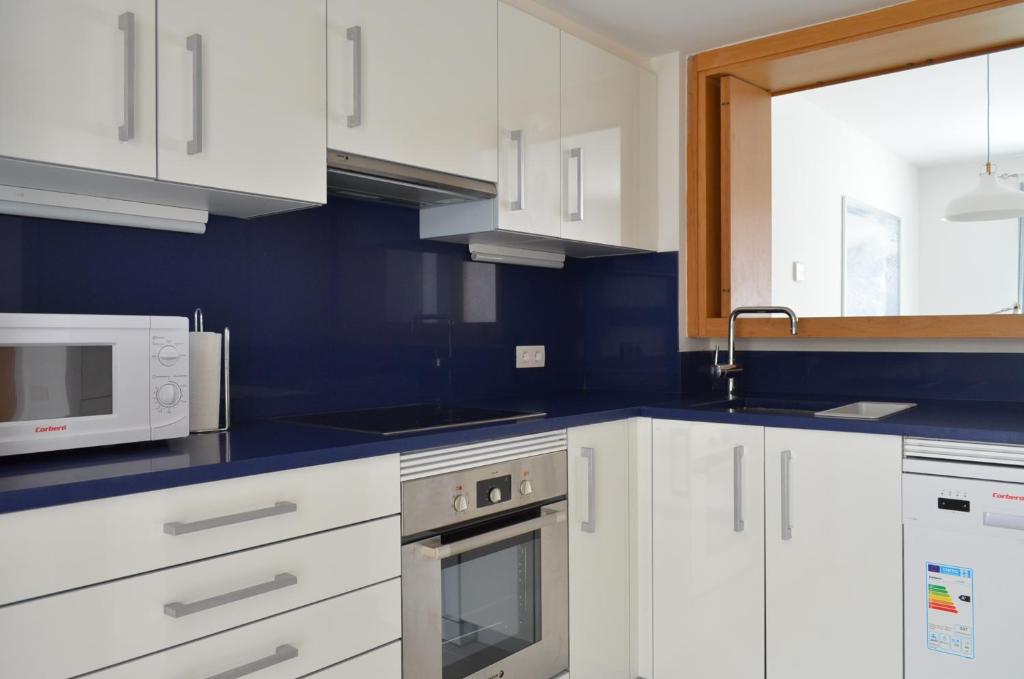 Kuchyňa alebo kuchynka v ubytovaní Apartamentos Macenas