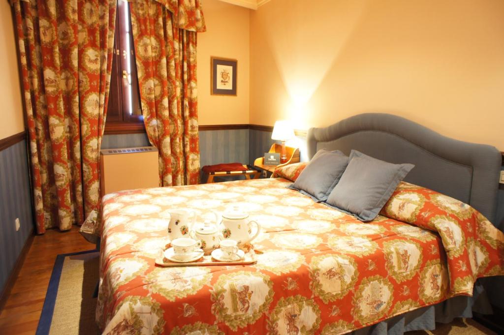 Postel nebo postele na pokoji v ubytování Casavillena Apartamentos Turísticos