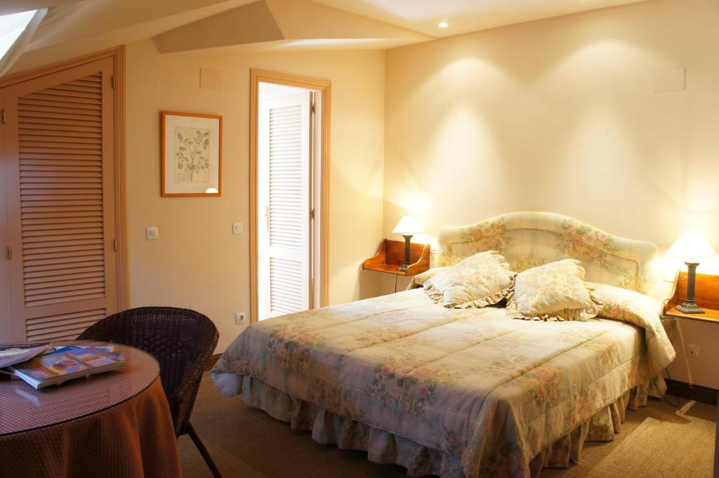 Postel nebo postele na pokoji v ubytování Casavillena Apartamentos Turísticos