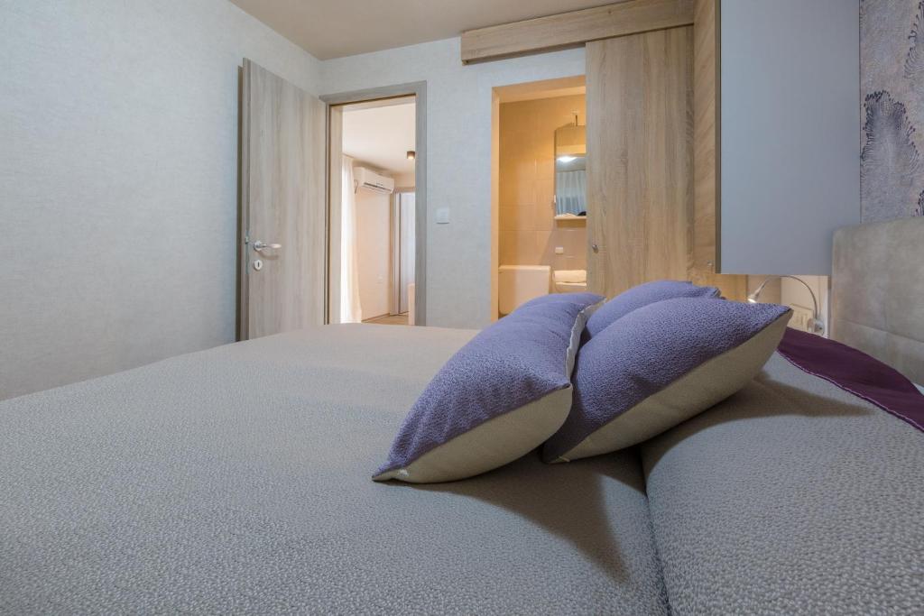 Postel nebo postele na pokoji v ubytování Lando Resort