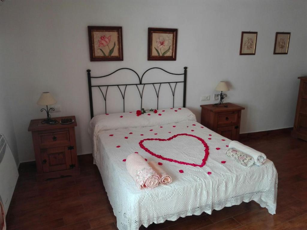 Postel nebo postele na pokoji v ubytování Casita de Rosario