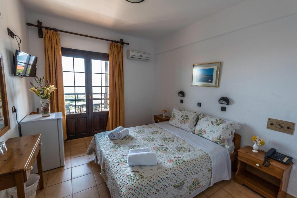 Postel nebo postele na pokoji v ubytování Hotel Sylvia