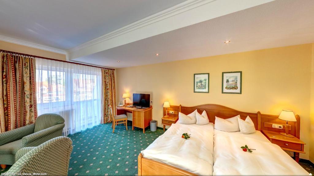 Postel nebo postele na pokoji v ubytování Hotel Nordkap
