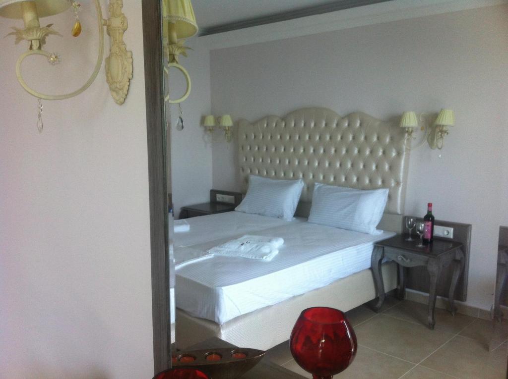 Postel nebo postele na pokoji v ubytování Palatino Hotel