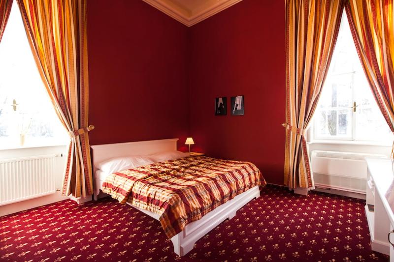 Postel nebo postele na pokoji v ubytování Park Hotel Tartuf