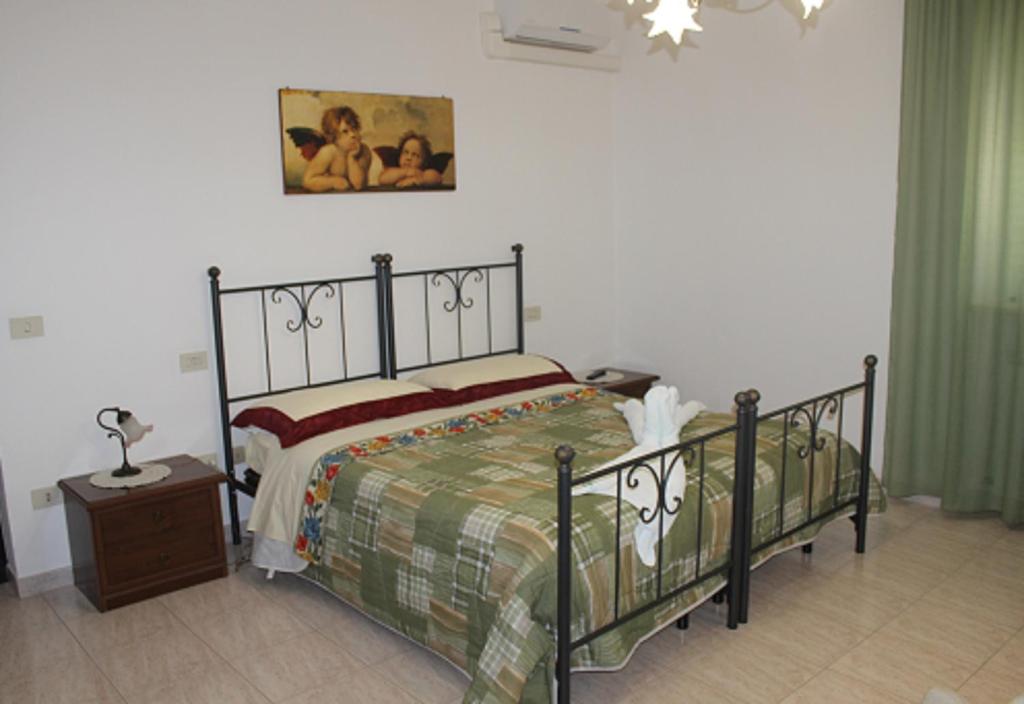 Postel nebo postele na pokoji v ubytování Ai Prati Vecchi