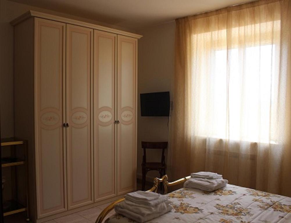 Postel nebo postele na pokoji v ubytování Ai Prati Vecchi