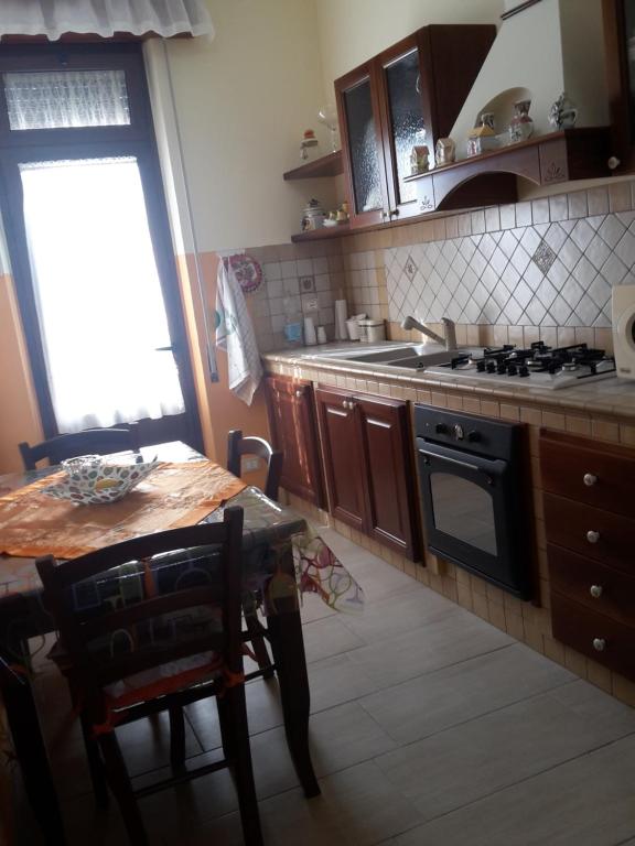 Kuchyň nebo kuchyňský kout v ubytování Datterina