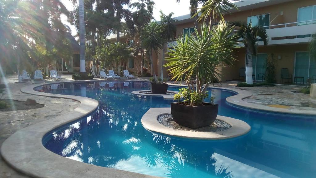 Bazén v ubytování Tecnohotel Mérida Norte nebo v jeho okolí