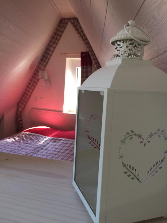 Postel nebo postele na pokoji v ubytování Gîte chez "Mamie Schlop"