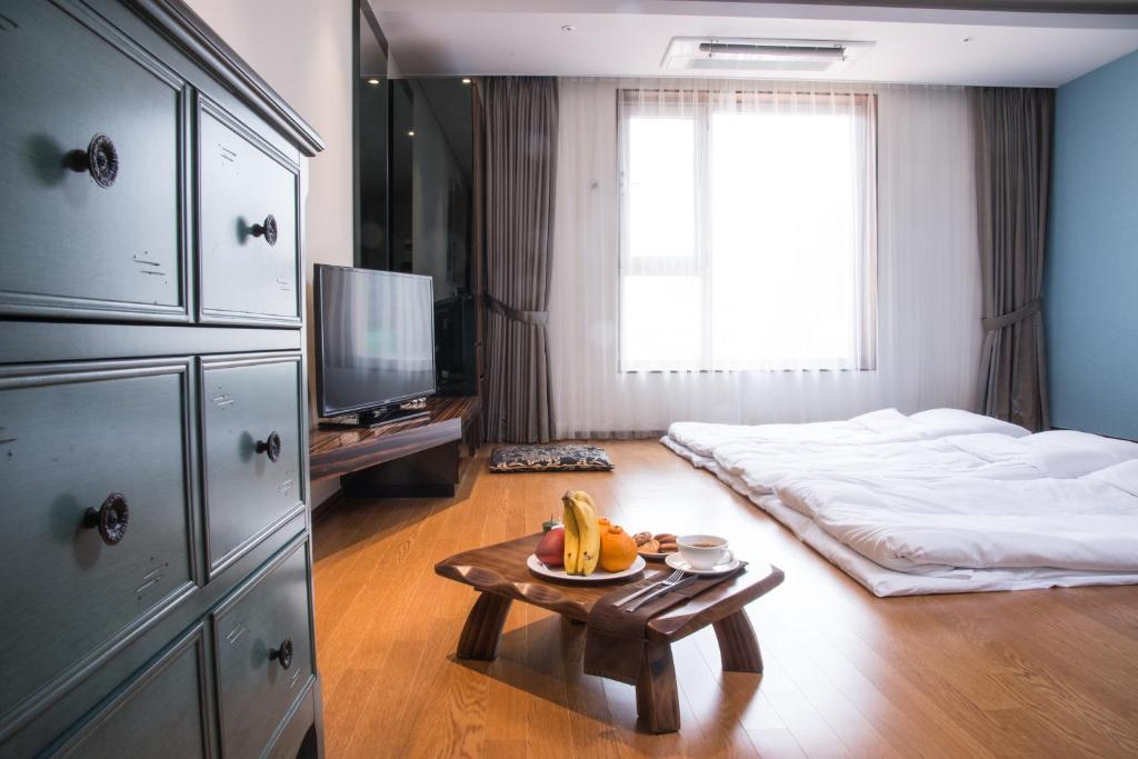 Postel nebo postele na pokoji v ubytování Hotel Leo