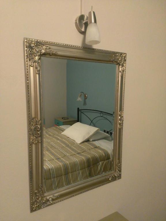 A bed or beds in a room at Artemis