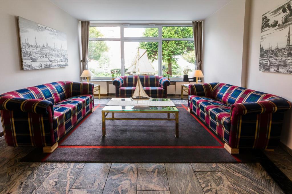 Posezení v ubytování Michels Hanseatic Hotel Norderney