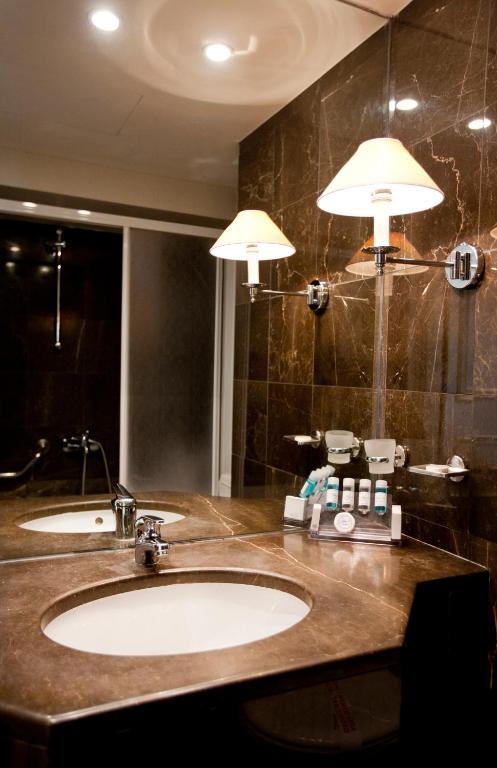 Koupelna v ubytování Hera Hotel
