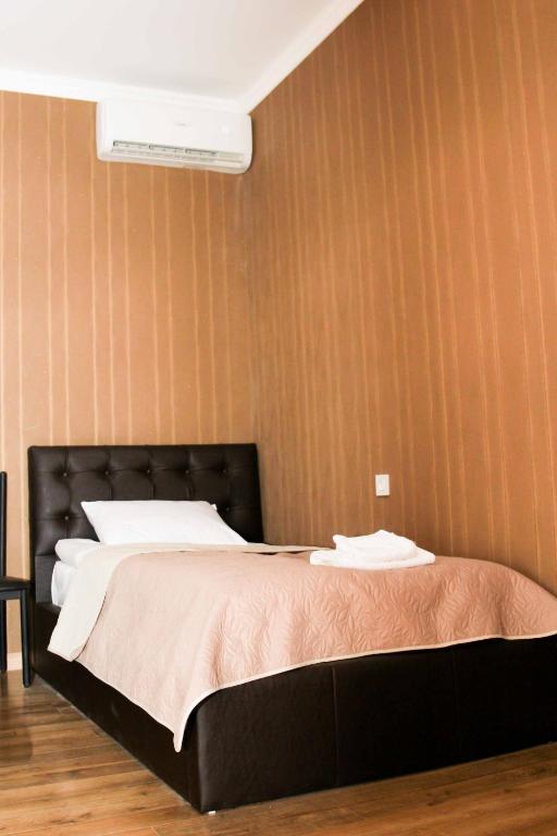 Postel nebo postele na pokoji v ubytování Hotel New Telavi