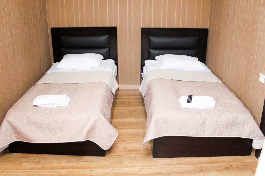 Postel nebo postele na pokoji v ubytování Hotel New Telavi