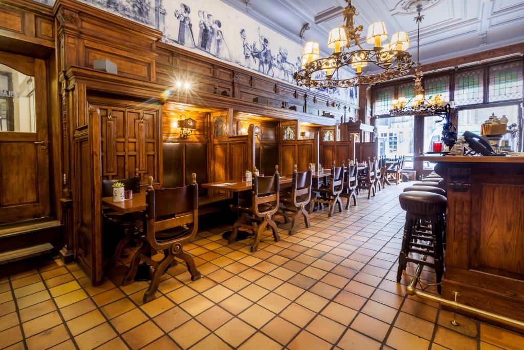 Een restaurant of ander eetgelegenheid bij Hotel Die Port van Cleve