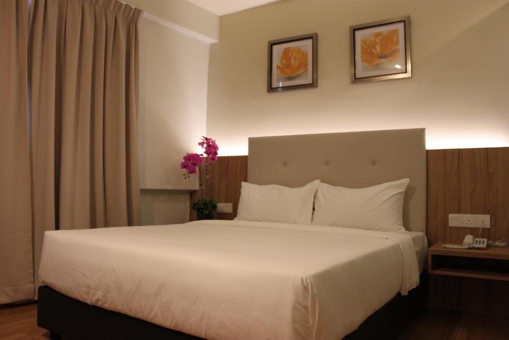 Postel nebo postele na pokoji v ubytování BIG M Hotel