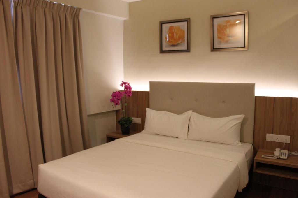 Postel nebo postele na pokoji v ubytování BIG M Hotel