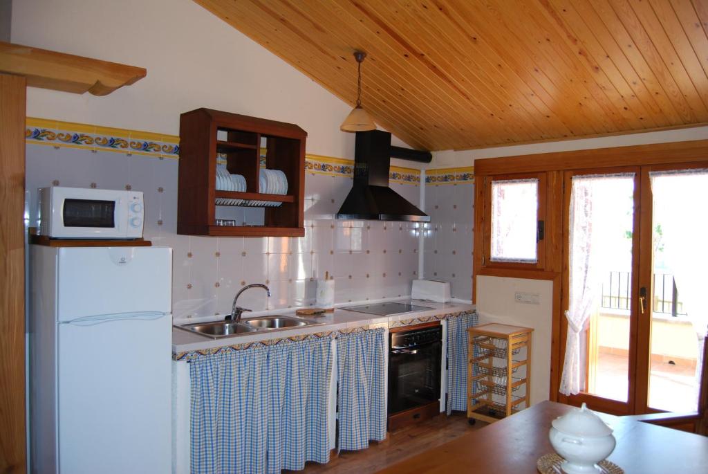 Kuchyň nebo kuchyňský kout v ubytování Casa Lueza