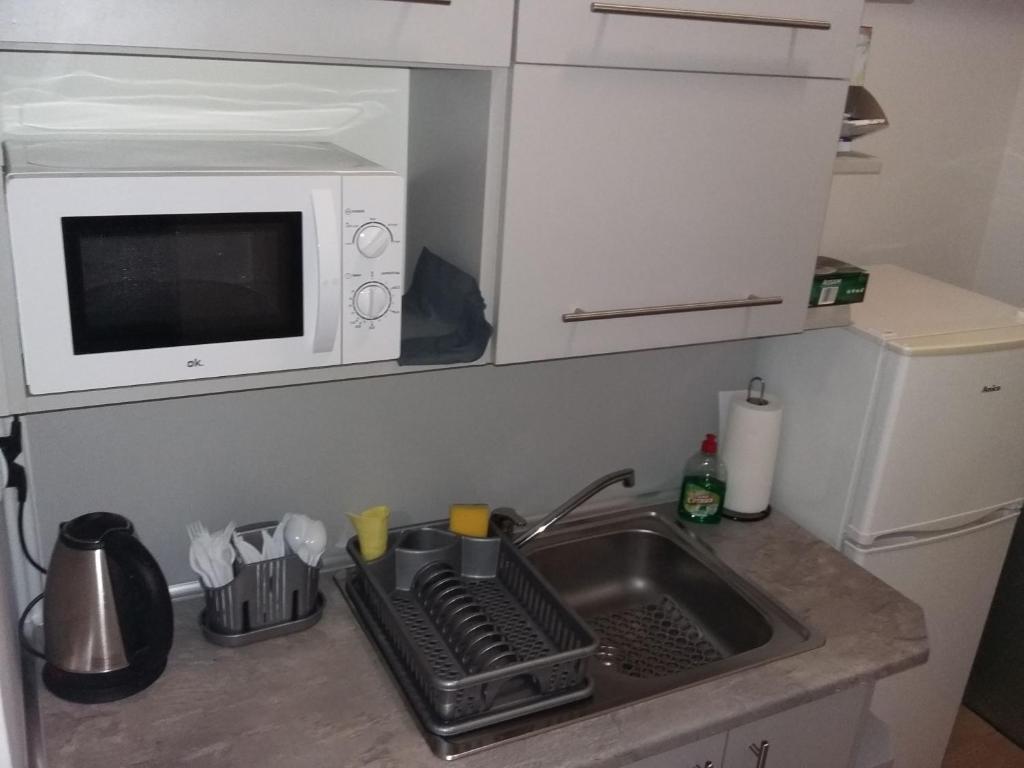 Kuchyň nebo kuchyňský kout v ubytování Hostel Sopot Centrum