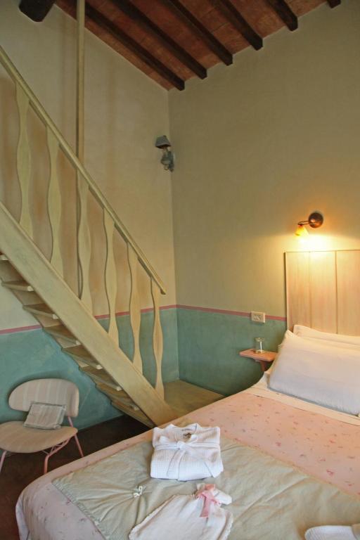 Postel nebo postele na pokoji v ubytování Agriturismo Tara