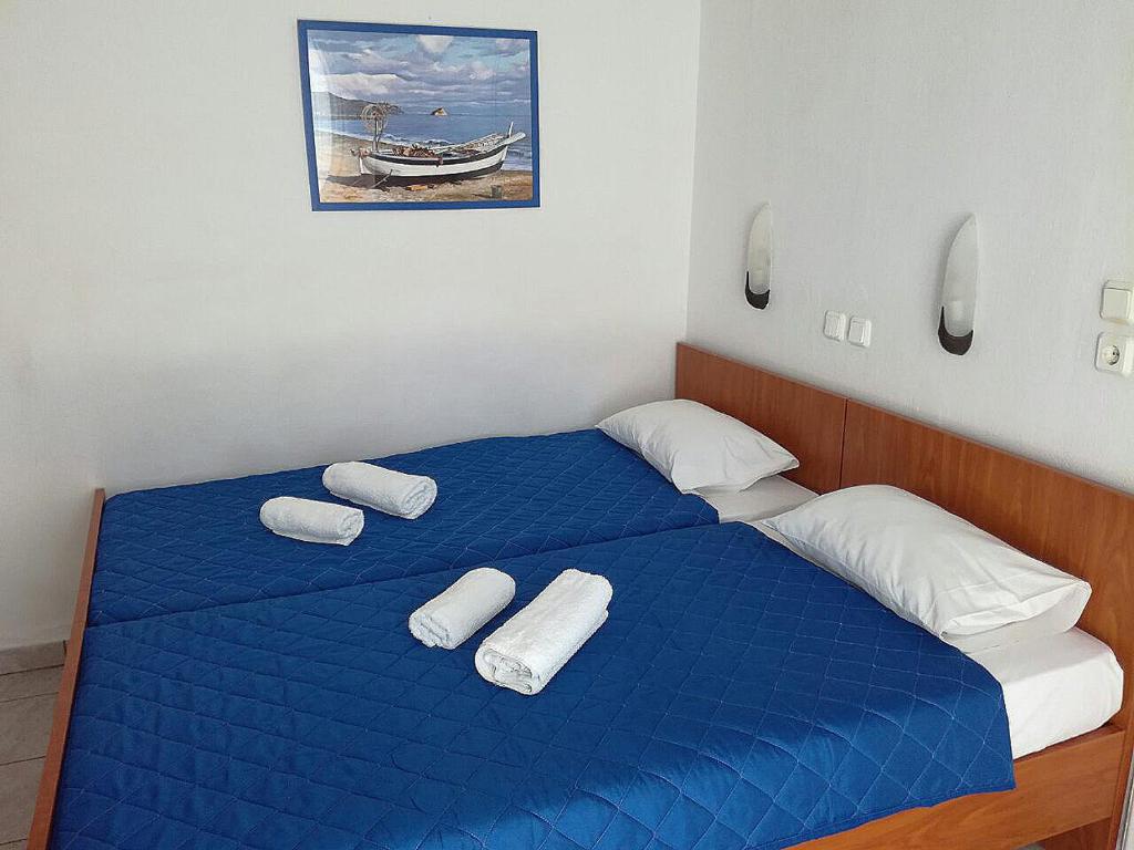 Postel nebo postele na pokoji v ubytování Rooms Ntontas