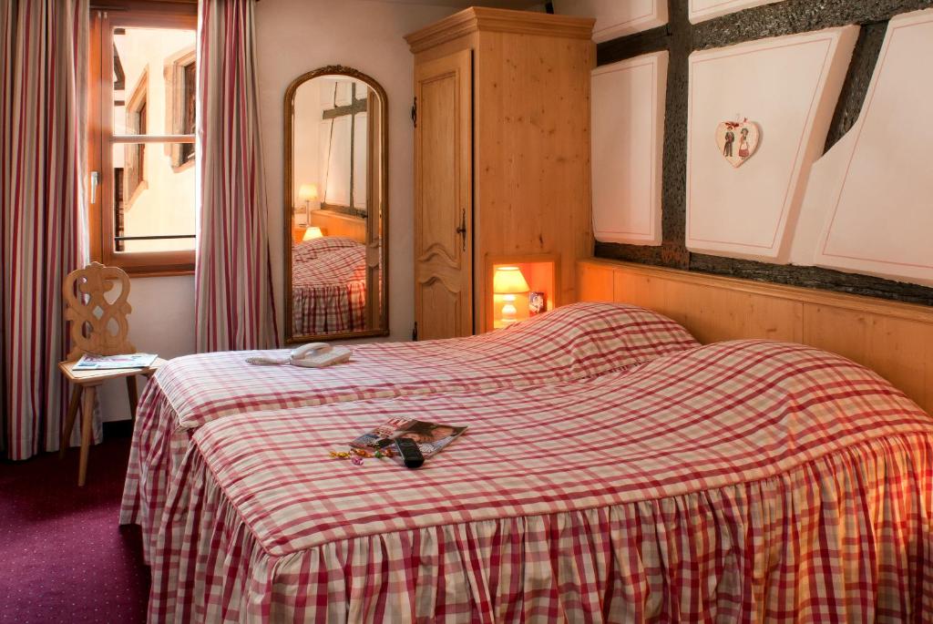 Postel nebo postele na pokoji v ubytování Hotel Saint-Martin