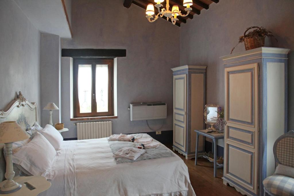 Postel nebo postele na pokoji v ubytování Agriturismo Tara