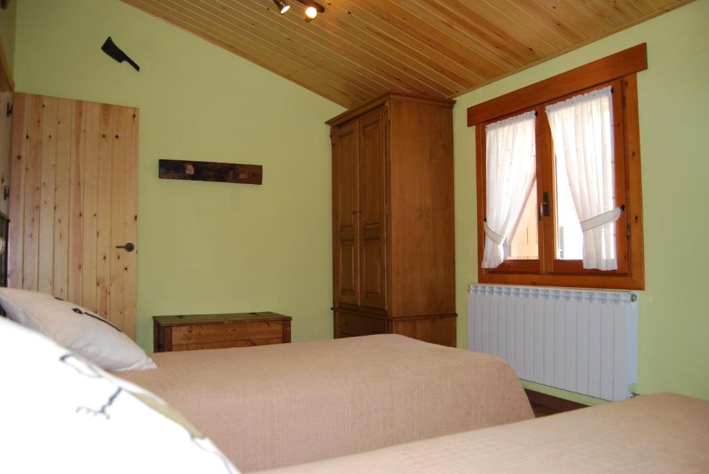 Postel nebo postele na pokoji v ubytování Casa Lueza