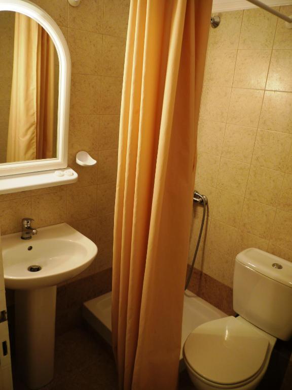 Koupelna v ubytování Hotel Markos