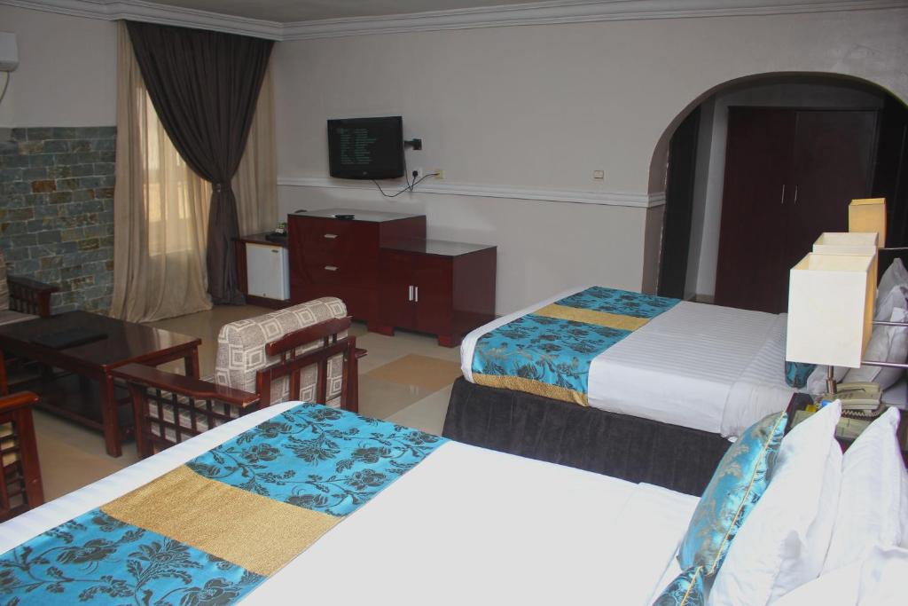 Postel nebo postele na pokoji v ubytování De Rembrandt Hotels and Suites
