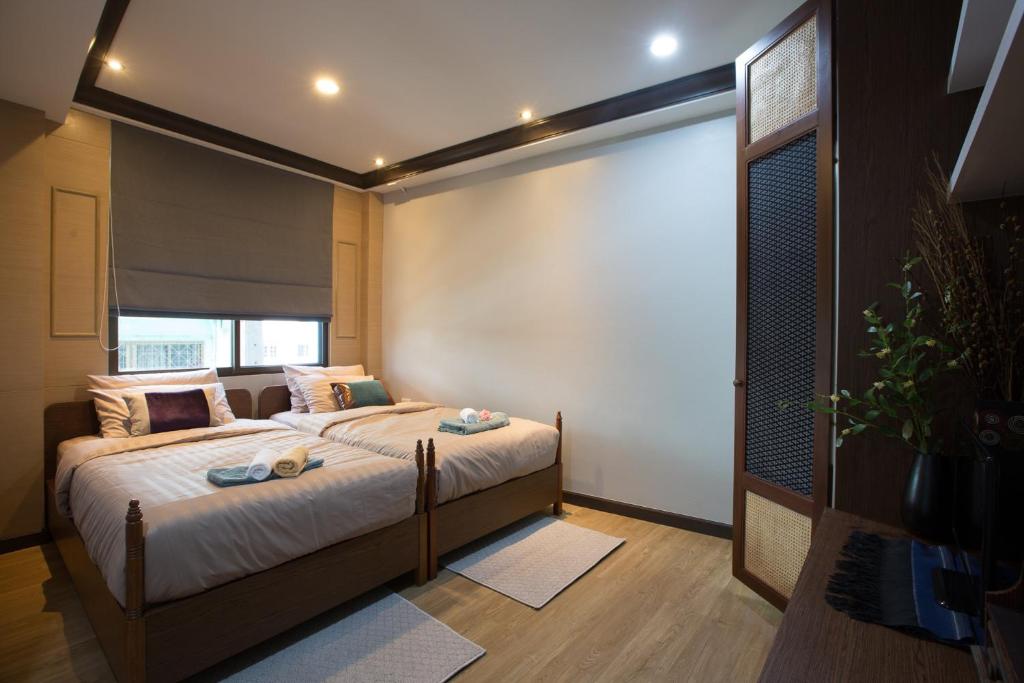 Giường trong phòng chung tại PAMAhouse Boutique Hostel