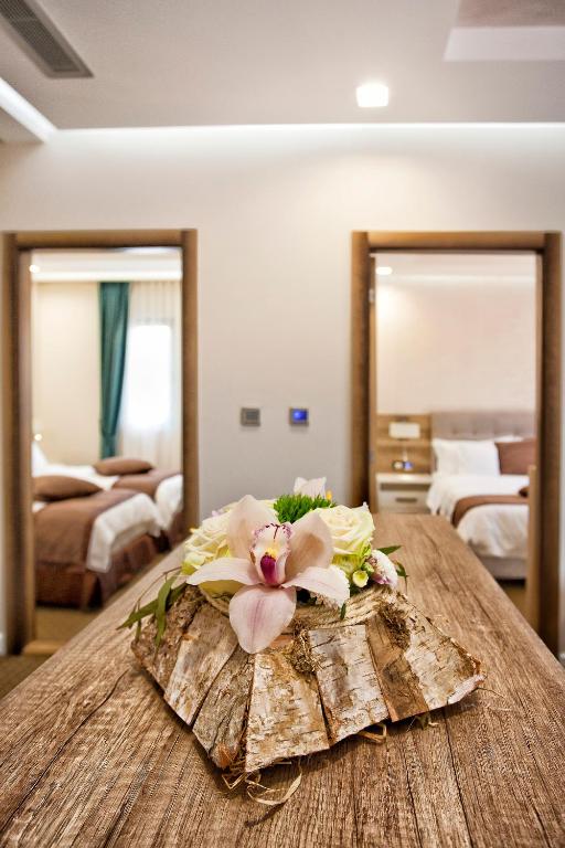 Postel nebo postele na pokoji v ubytování Wellness & Spa Hotel ACD