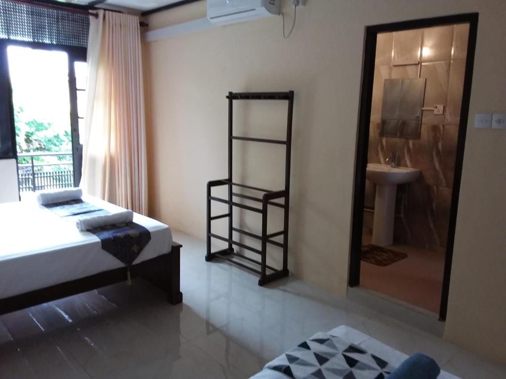 Postel nebo postele na pokoji v ubytování Colombo Residence