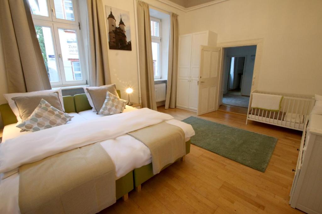Postel nebo postele na pokoji v ubytování Hotel Sudpfanne