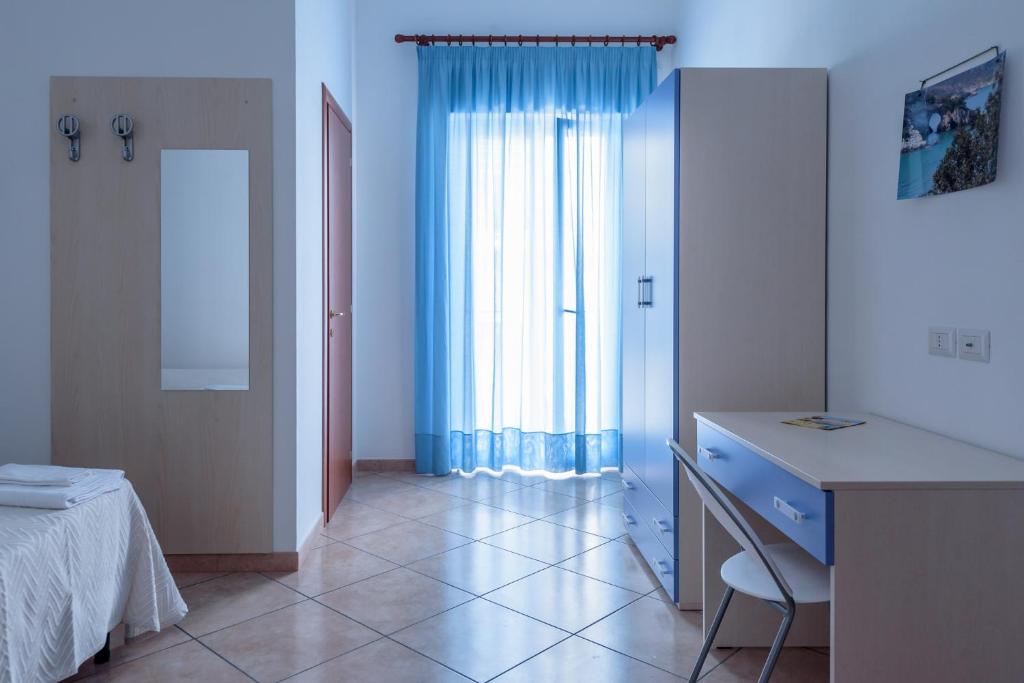Postel nebo postele na pokoji v ubytování B&B Rose Villa