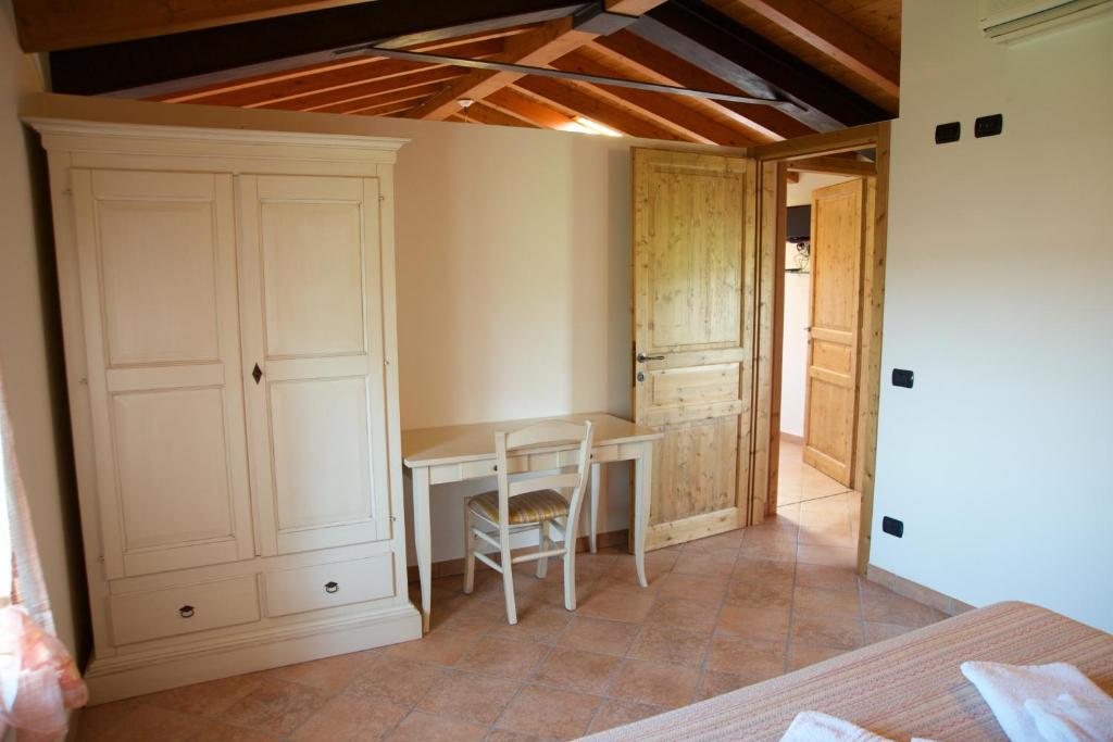 Postel nebo postele na pokoji v ubytování Agriturismo Albarello