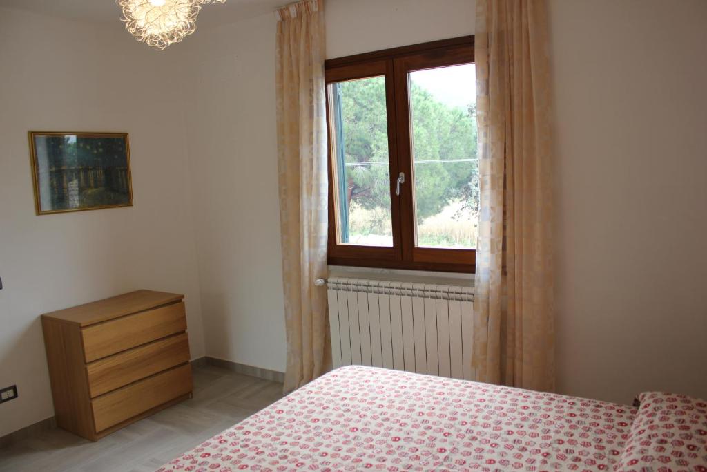 Postel nebo postele na pokoji v ubytování Podere L'Isolella