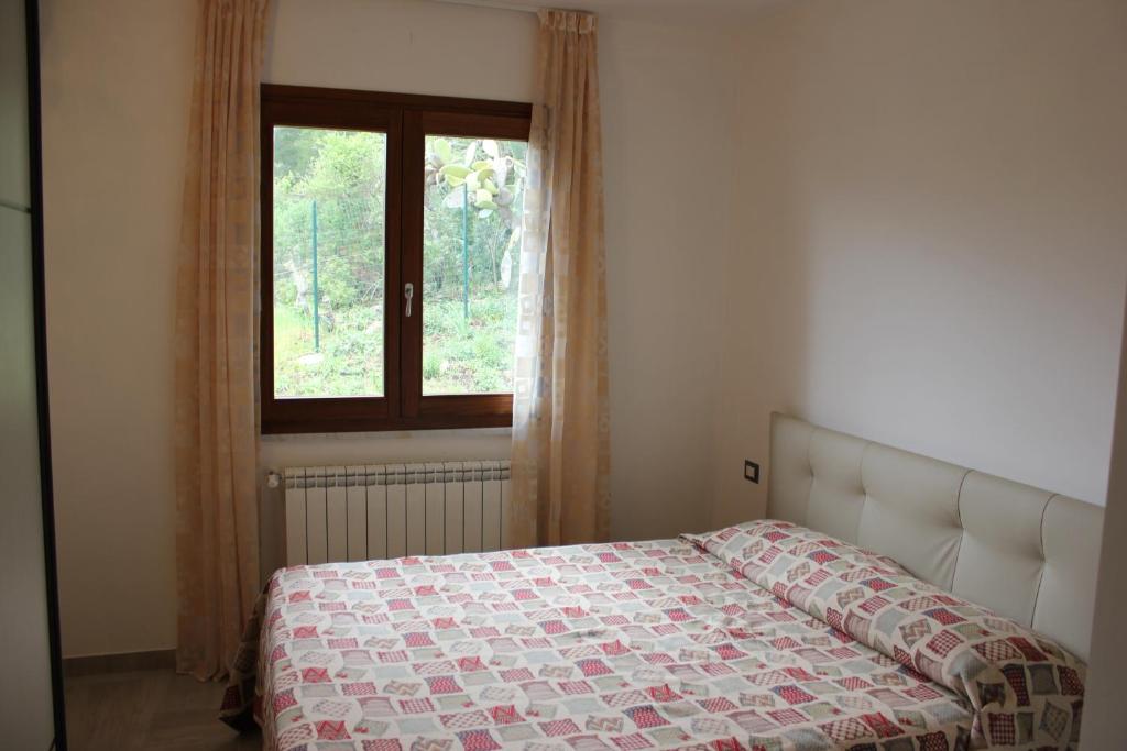 Postel nebo postele na pokoji v ubytování Podere L'Isolella