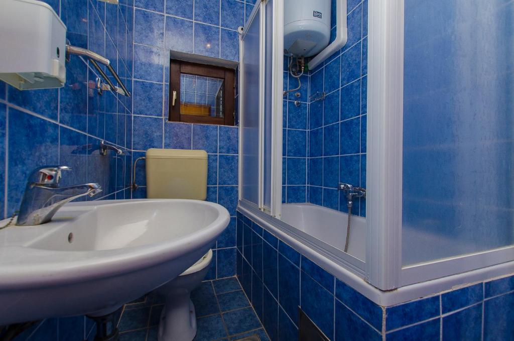 Koupelna v ubytování Apartments Bilo