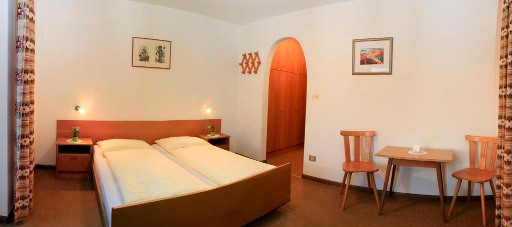 Postel nebo postele na pokoji v ubytování Pension Rastnerhof