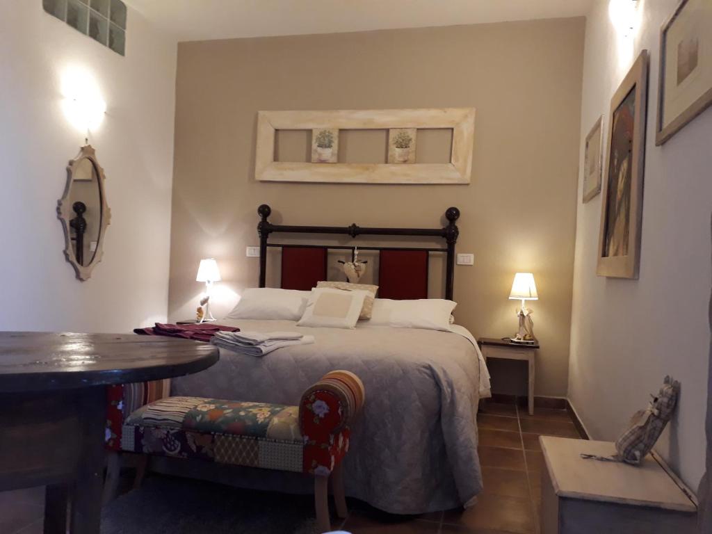 Posteľ alebo postele v izbe v ubytovaní Agriturismo San Giacomo