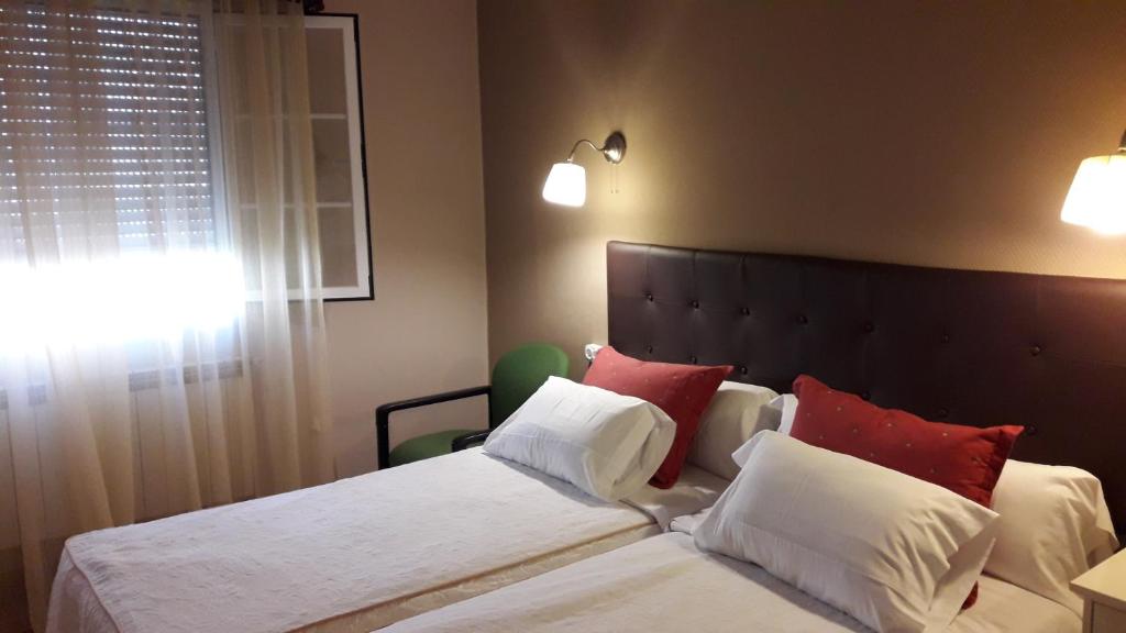 Postel nebo postele na pokoji v ubytování Hostal Martin - Sanabria