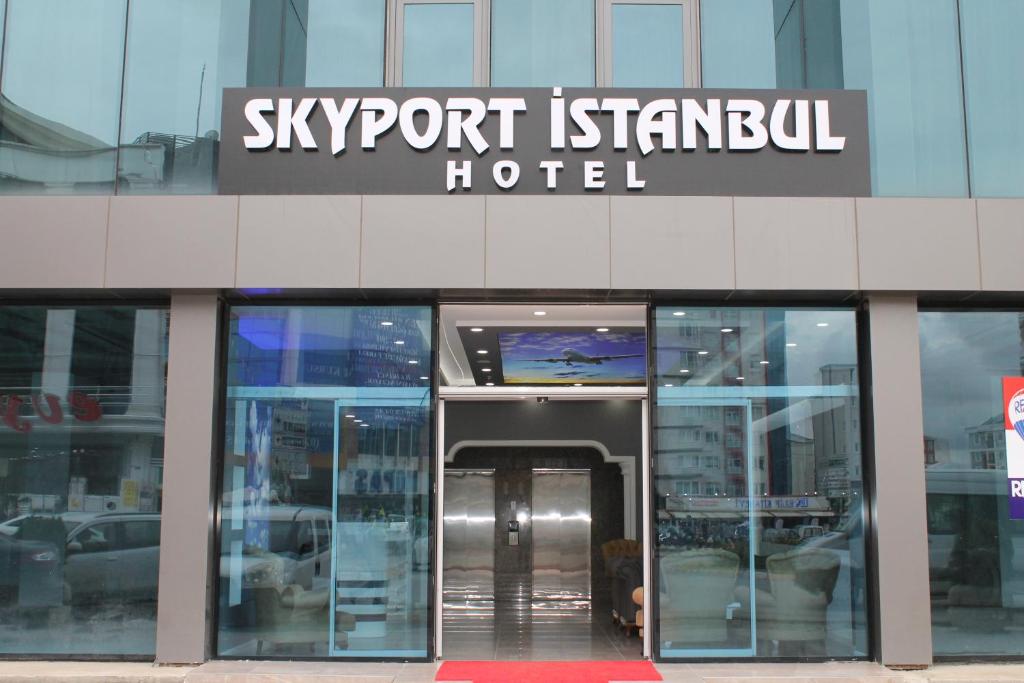 a building with a sign on the side of it at Skyport Istanbul Hotel in Istanbul
