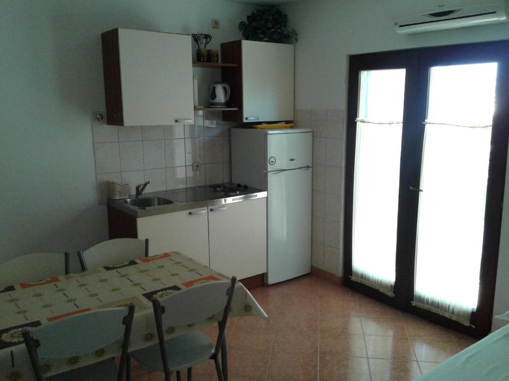 Kuchyňa alebo kuchynka v ubytovaní Apartments Tomislav Mamic