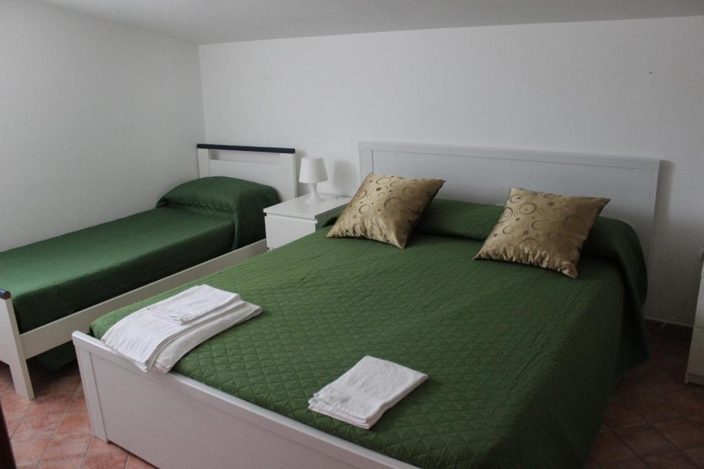 Postel nebo postele na pokoji v ubytování B&B Pizzo Cannicchio