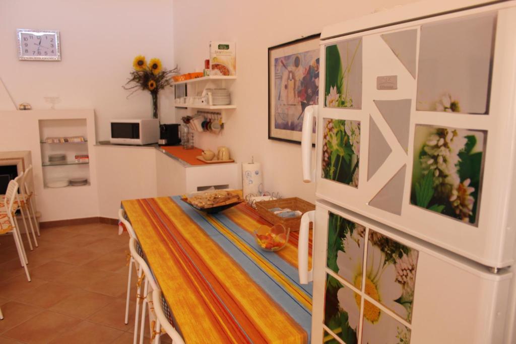 Kuchyň nebo kuchyňský kout v ubytování B&B Pizzo Cannicchio