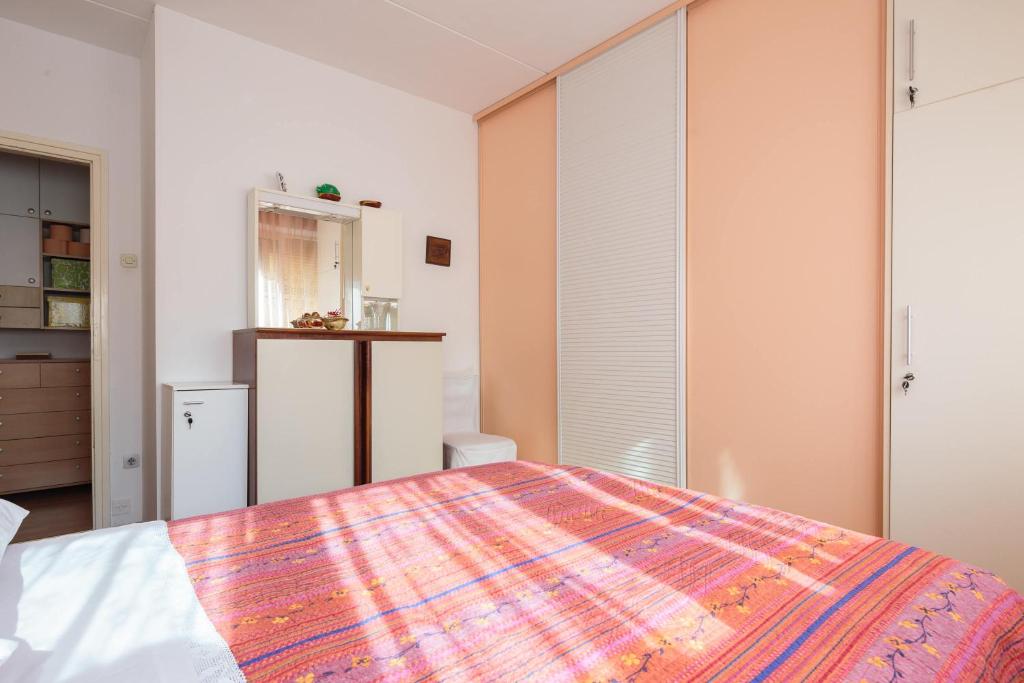 Postel nebo postele na pokoji v ubytování Apartment Karolina