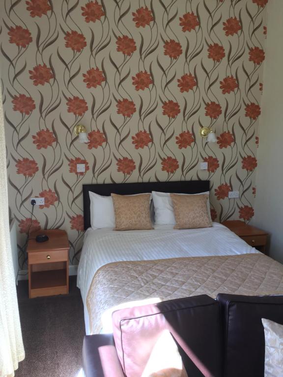 A bed or beds in a room at The Bayview 